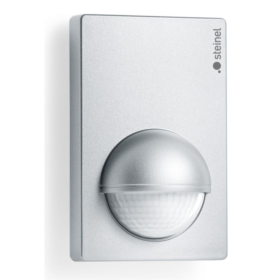 IS 180-2 sienas Infrasarkano staru sensors ar 180° uztveršanas leņķi. Uztveršanas attāIums r=max.5/12m šķērskustībai un r=max.4 m kustībai uz sensoru. Pieslēguma jauda 1000W, LED max.6x58W. Montāžas augstums 1,8-4m. STEINEL